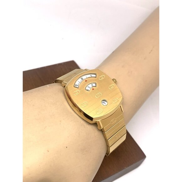 Gucci Unisex Watch YA157403 Grip Swiss Quartz Jump Hour Dial Gold Steel 35mm - Picture 6 of 14